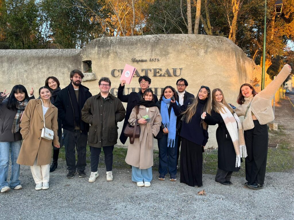 group of international students waiving